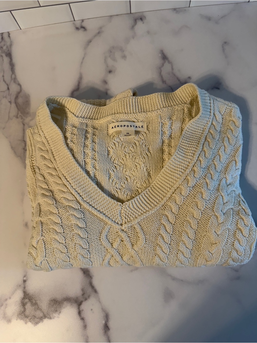 Aeropostale chunky cable knit sweater in a soft cream/ivory color, women’s size